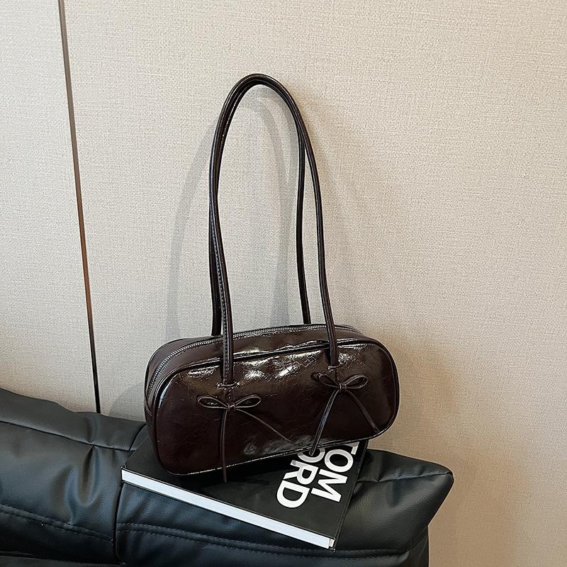 

Niche design trendy premium texture bow pillow bag fashionable large capacity versatile shoulder armpit bag кавовий