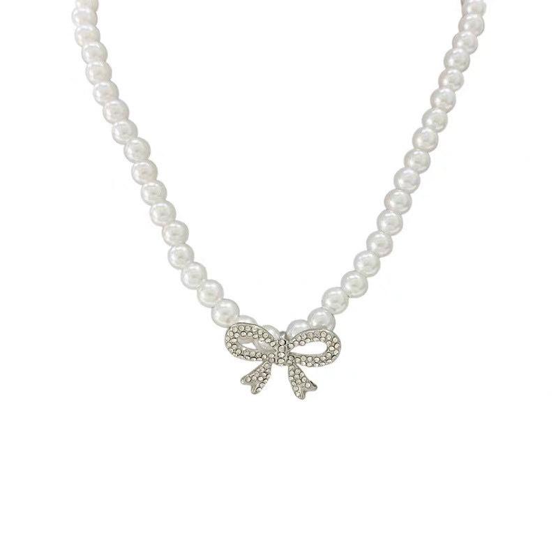 Nk-196 Diamond-Encrusted White K Bow Pearl Necklace Short High-End Niche Light Luxury Women'S New Internet Celebrity Explosion