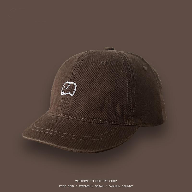 

Retro short brim cap female couple versatile soft top thin baby elephant embroidered short edge baseball cap men Adjustable темно-коричневого