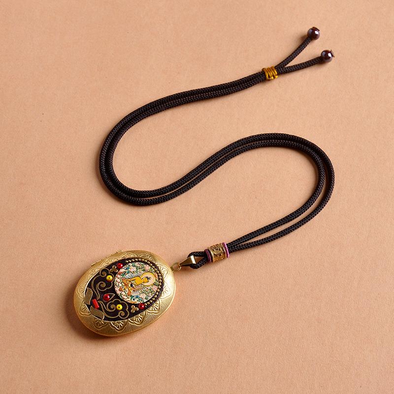 Vairochana Yellow Tibetan Amulet: Brass Box Pendant Necklace with Jambhala & Avalokiteshvara Hollow Design