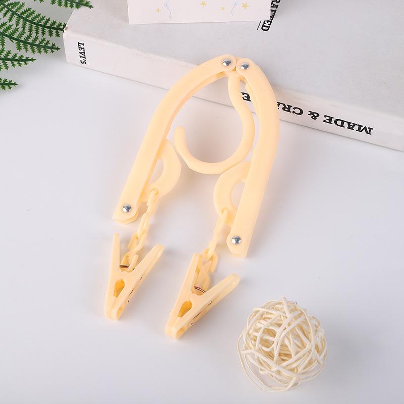 Multifunctional Non-Slip Folding Clothes Hanger & Drying Rack for Travel, Dormitory, or Hotel.