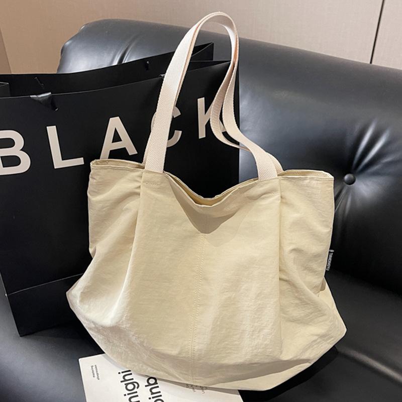 Minimalist Nylon Tote Bag with Spacious Design and Durable Handles Perfect for Everyday Use and Shopping