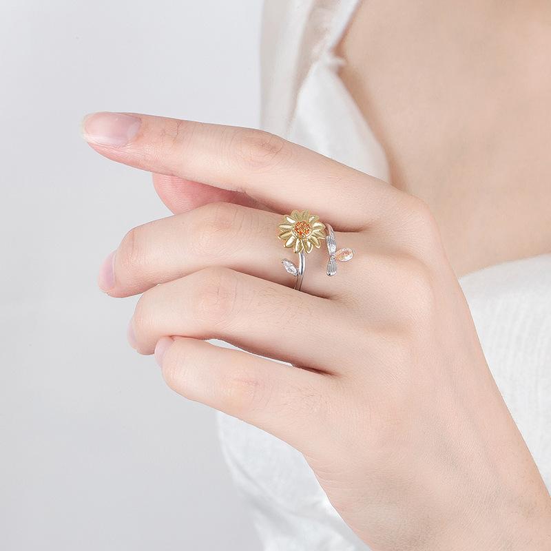 Japanese and Korean Fashion Couple Women's Ring Rotating Ring New Flower Shape Electroplated Copper Ring Exquisite