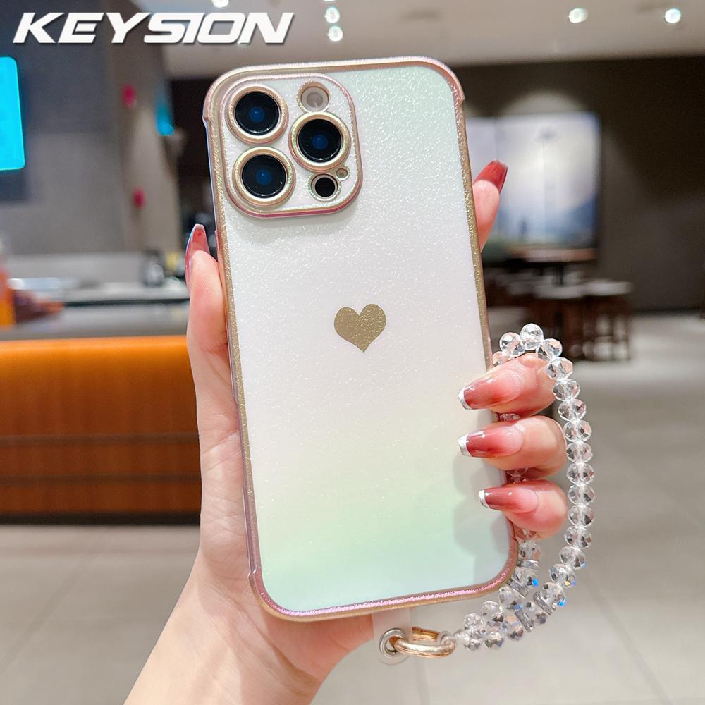 KEYSION Custodia per Telefono in TPU Colorata a Gradiente per iPhone 13 14 15 16 17 Pro Max 17 Air 16e 16 Plus Cover Posteriore Antiurto con Braccialetto di Cristallo