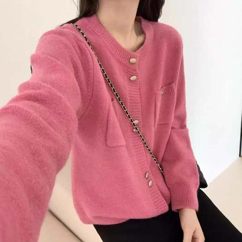 Real autumn and winter new gentle wind double-breasted design sense pocket knitted cardigan women's solid color crew neck sweater jacket