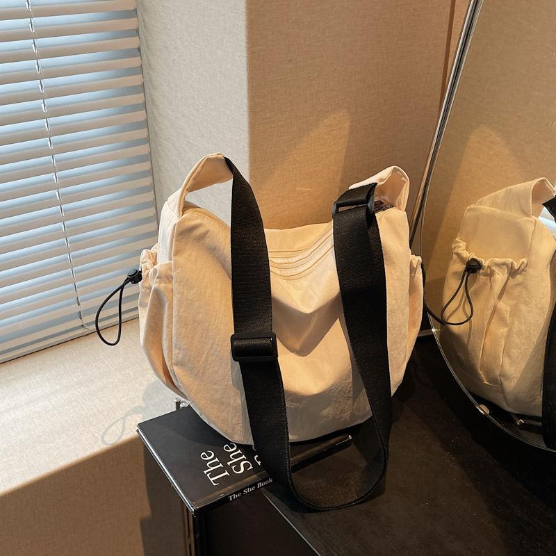 Canvas bag lazy wind large capacity bag women 2025 new simple casual messenger bag dumpling bag
