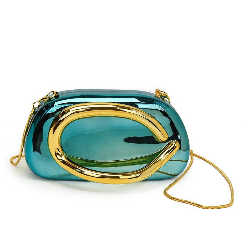 

Foreign trade women s bag 2025 new European and American fashion metal wrist bag personalized glossy chain messenger dinner bag зелений