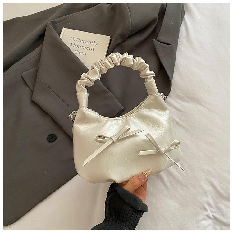 

2025 summer new bow underarm bag women s leisure commuting niche pleated cloud bag dumpling bag белый