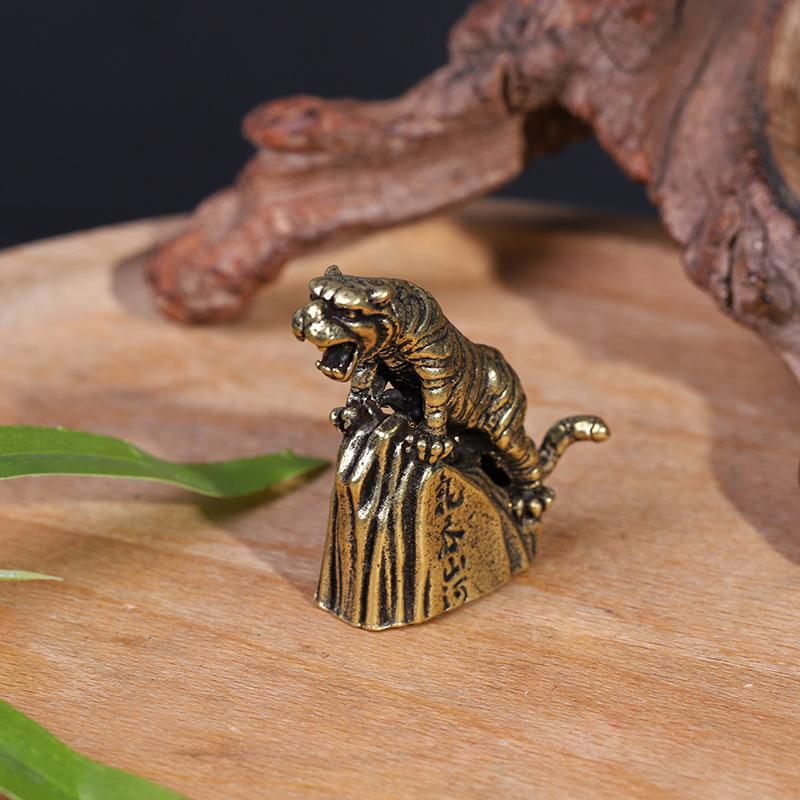 

Solid pure brass office desktop small ornament zodiac tiger swallows mountains and rivers tea pet handicrafts hand play piece