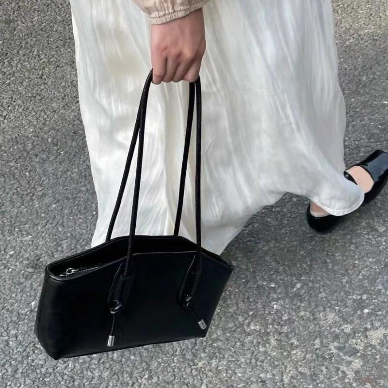 IELGY Damen schwarze Achseltasche, High-End Nischenmode Pendler Schultertasche