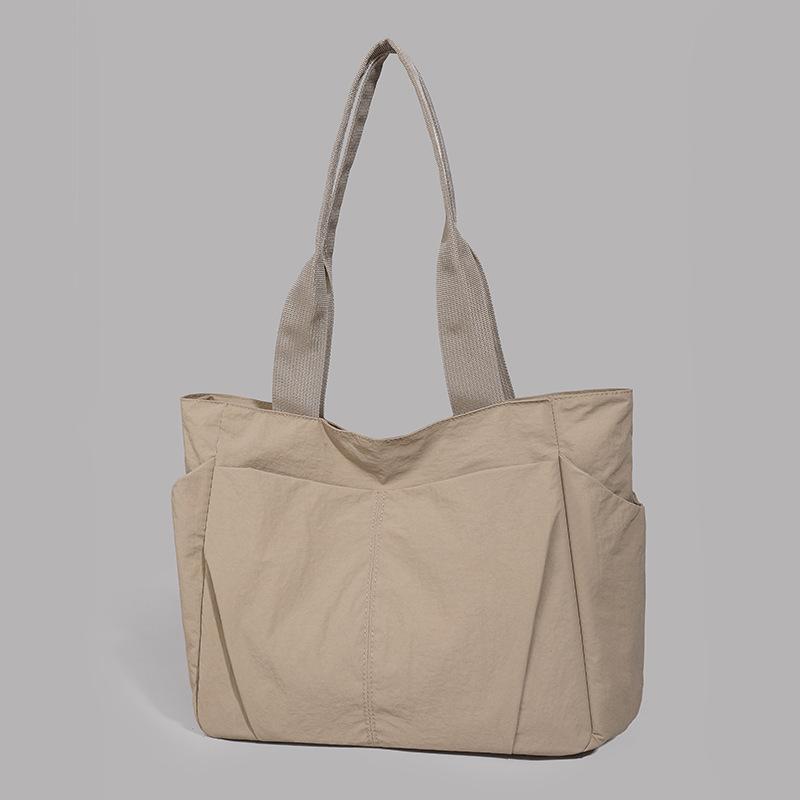 Large-capacity simple casual shoulder bag women's new versatile lightweight tote bag class commuter bag