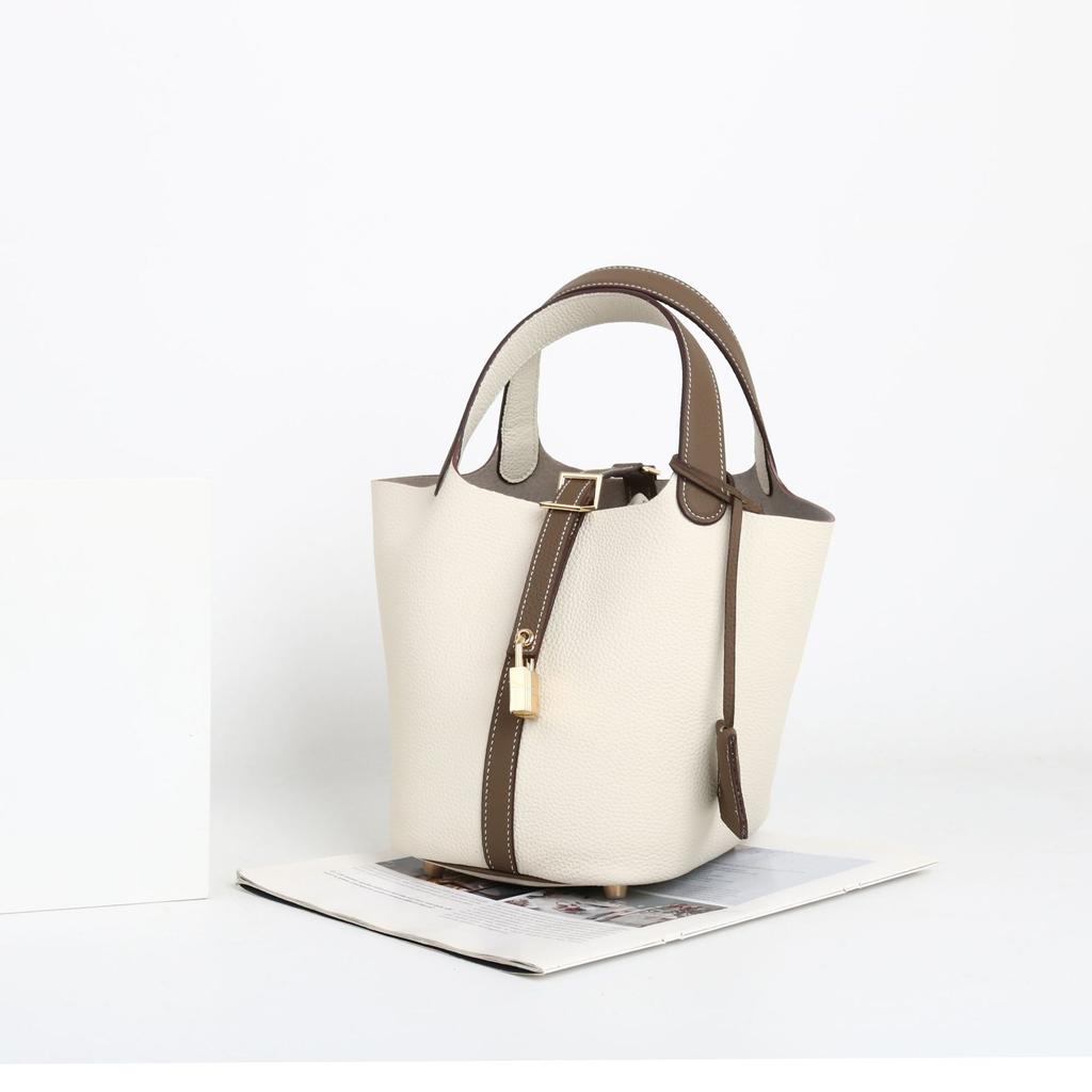 Cesta de Verduras Empalmada de Piel de Vaca de Primera Capa Togo 2026 Nueva Moda Bolso Cubo Suave de Piel de Vaca con Asa y Bolso