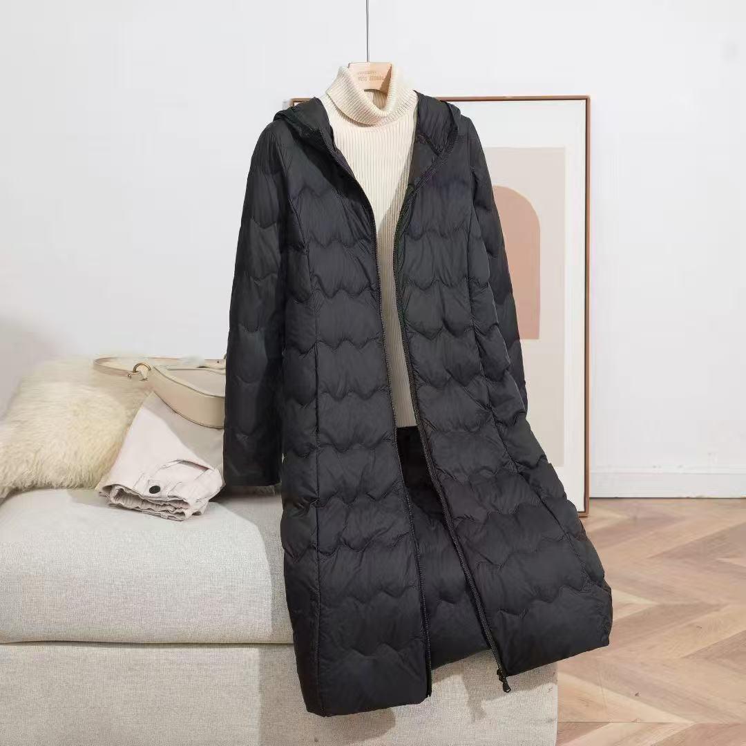 

Жіноча легка пухова куртка-пальто з капюшоном та хвилястим дизайном 2025 XL чорний