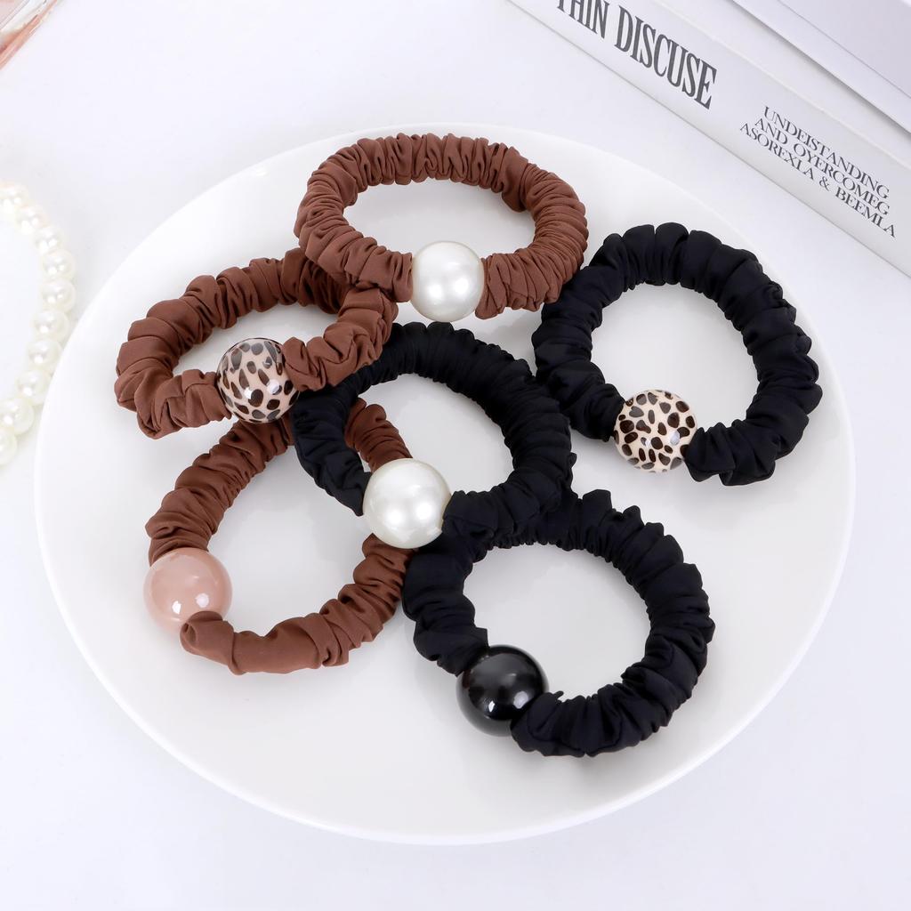 hair for Elegant and suitable for women with thick Perfect for everyday or as a Pearl-trimmed tie, scrunchie-style, women. simple, hair. wear,