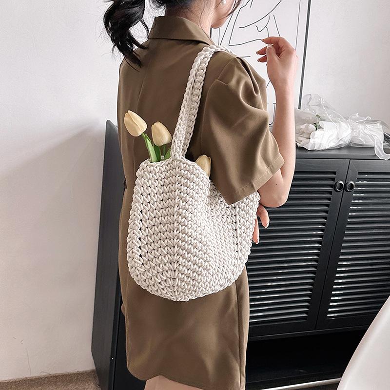 Casual large-capacity cotton thread woven bag, new openwork straw bag, lazy style shoulder bag, vacation beach bag, women's bag
