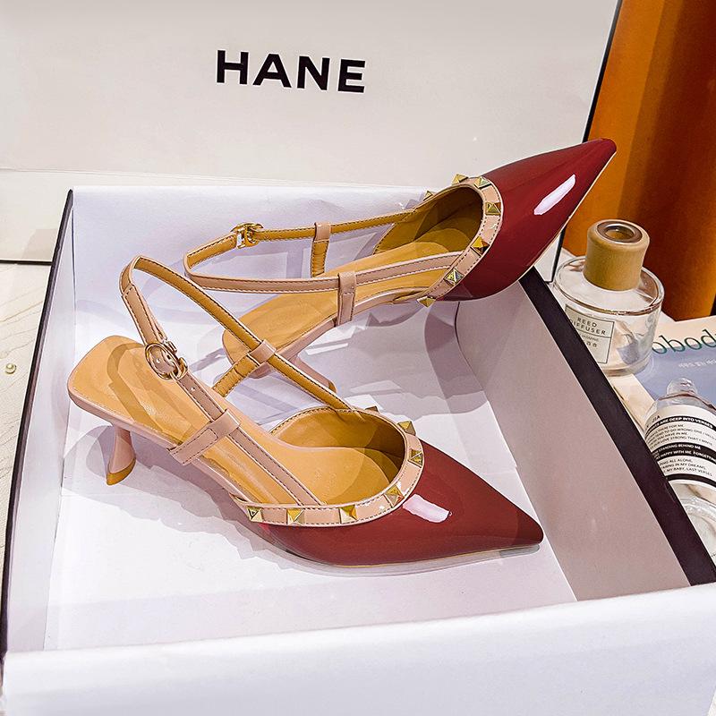 Baotou sandals women's 2025 new rivets one-word buckle belt fairy wind back empty single shoes pointed high heels stiletto