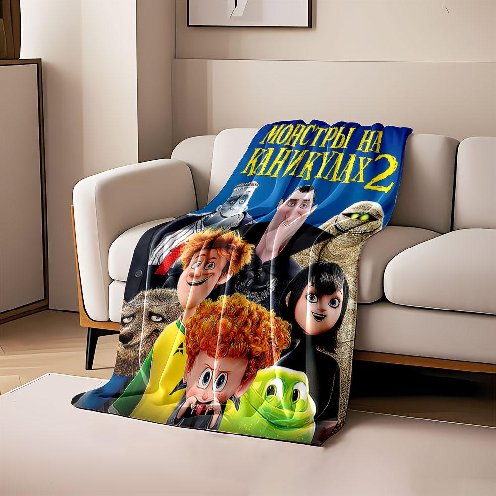 

The pattern showcases colorful animated monster characters on a blue background. for all seasons blanket lunch break throw gift 80cm x 120cm