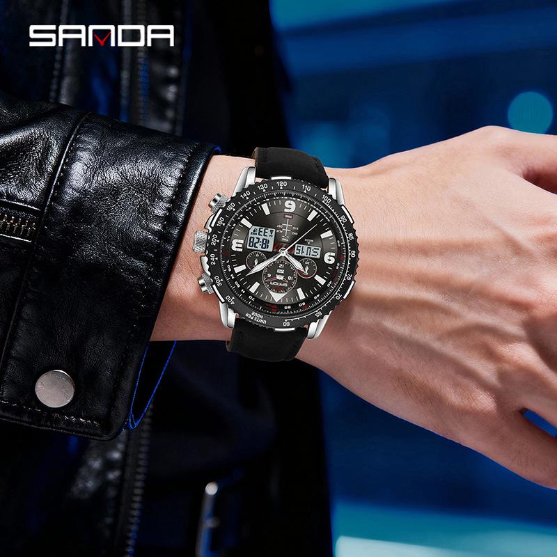 Orologio da polso da uomo Sanda a doppio movimento con display a tre finestre, multifunzioni, cinturino in pelle e acciaio e funzione impermeabile.