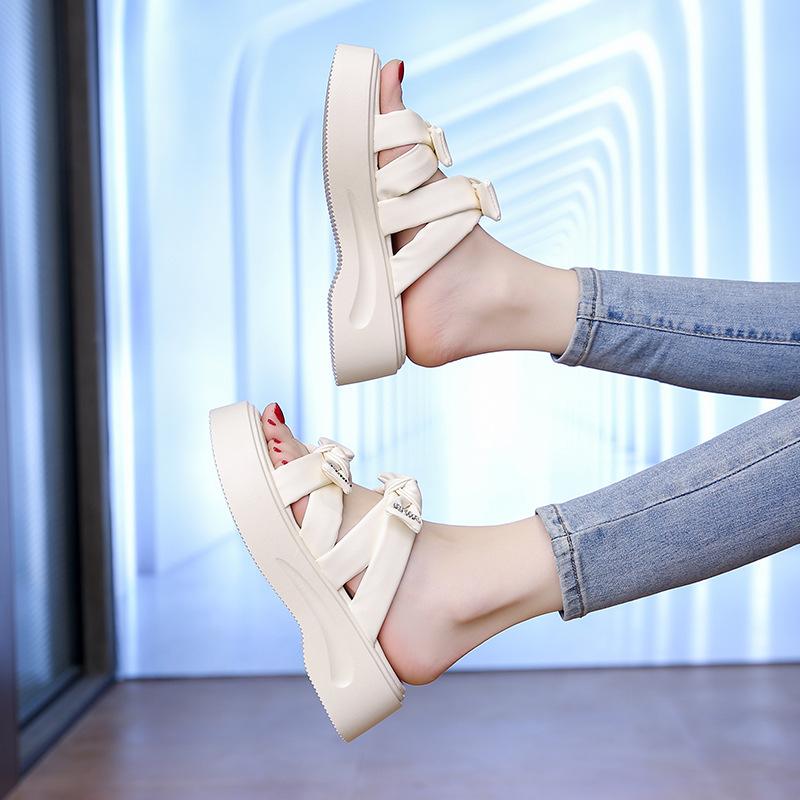 Thick-soled 4cm slippers for women's outer wear 2025 summer new bow-tie muffin heightening sandals versatile beach sandals