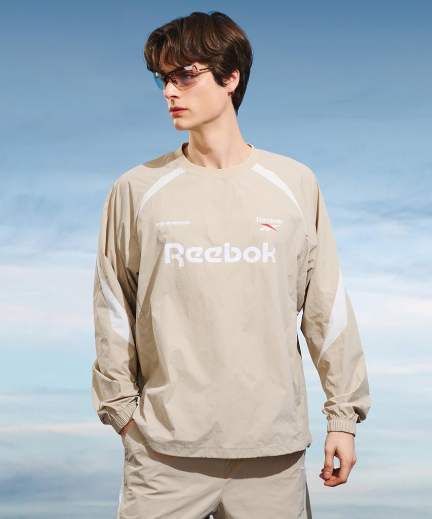 REEBOK Ellipse Woven Piste - Beige