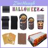 Materiały dekoracyjne na przyjęcie Halloween, w tym obrus z dyni i słomki**