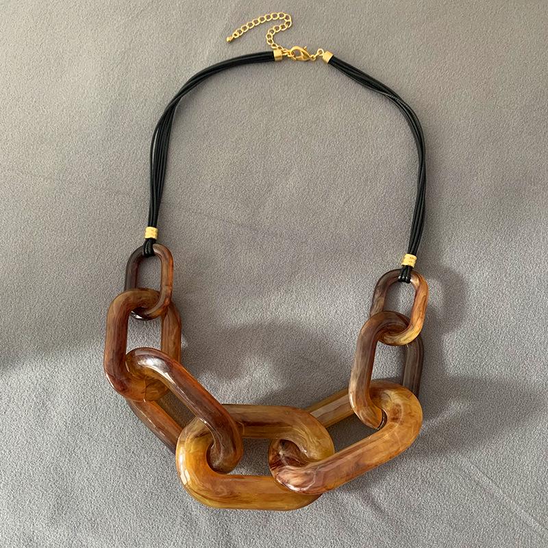 Vintage Resin Chain Leather Rope Necklace: A Unique Blend of European and American Design with Chinese Retro Flair