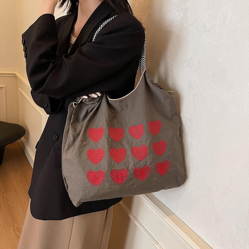 Personality trendy bag, foreign casual bag, women's 2025 new trendy Korean version of the college tote bag, large-capacity handbag