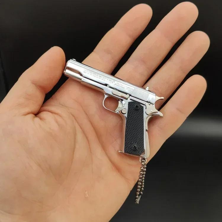 

1:3 Metal M1911 Toy Gun Detachable Model Alloy Keychain Look Real Collection PUBG Prop Fidgets Toy Birthday Gift for Boys серебряный