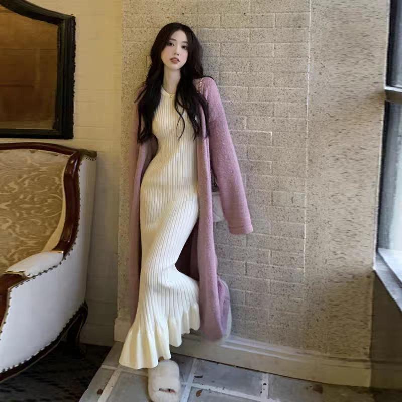 Skinny and tall long-sleeved hip-wrapped fishtail knitted skirt women's autumn new temperament gentle wind long dress
