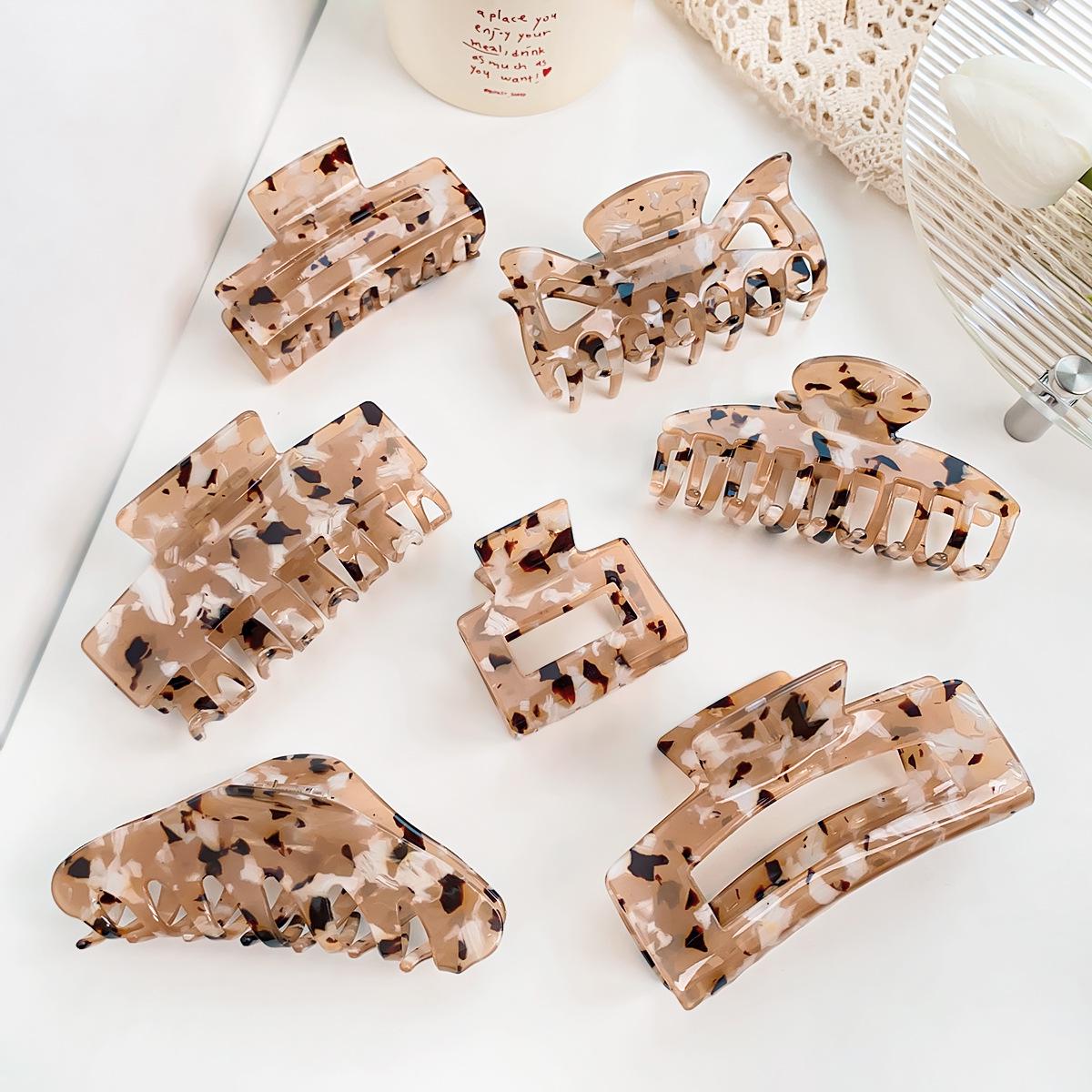 

Bofeiya Leopard Print Hollow Claw Clip - Korean Style Shark Clip for Elegant Updos Direct from Bofeiya Factory