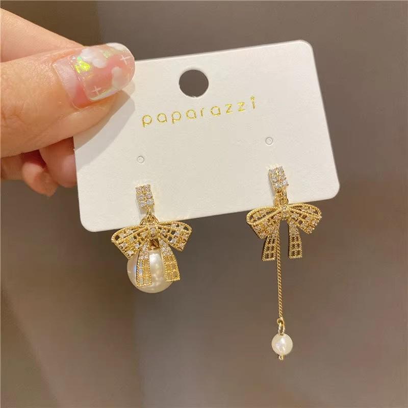 Sweet Girl Earrings Korean Version Bow Asymmetric Pearl Crystal Earrings Fashionable Temperament New Women s Clothing Sales