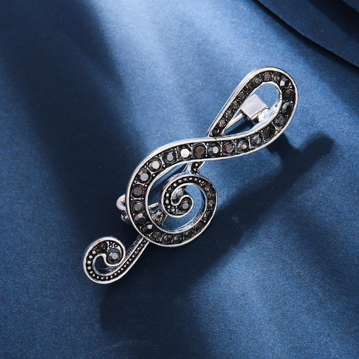 

Электронная коммерция Брошь в виде ноты из сплава с бриллиантами для мужчин и женщин, булавка для корсажа, одежда