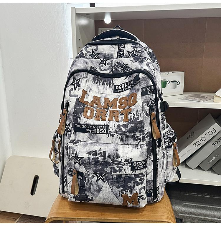 Schoolbag Trendy Cool Graffiti New Burden Reduction Schoolbag Junior High School Students Large Capacity Backpack High Value Lightweight Women's