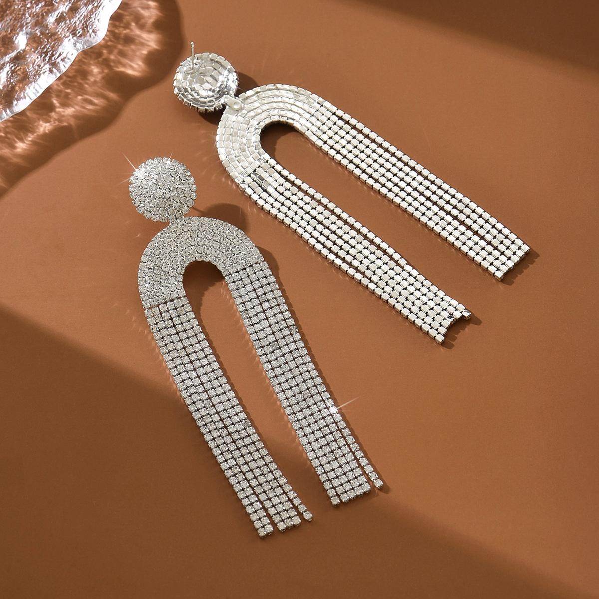 Amazon s best-selling luxury rhinestone long tassel earrings with personalized round hollow diamond studded earrings