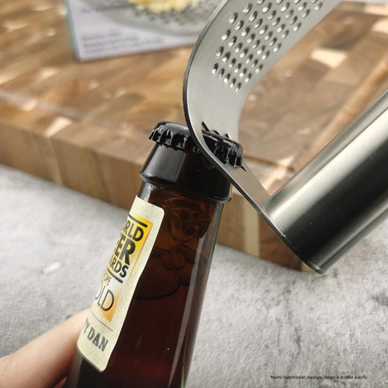 Celokruhový lis na česnek z nerezové oceli 304 Ruční zakřivený drtič česneku Mletí česnekové pyré Kuchyňský nástroj s otvírákem na láhve