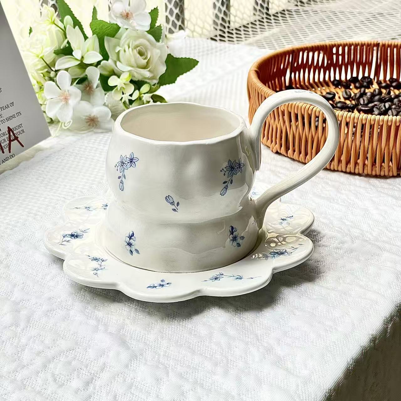 

French romantic ins style, ceramic cups and saucers, coffee cups with high , afternoon teacups, desserts with high handles, small floral blue flowers. coffee cup saucer