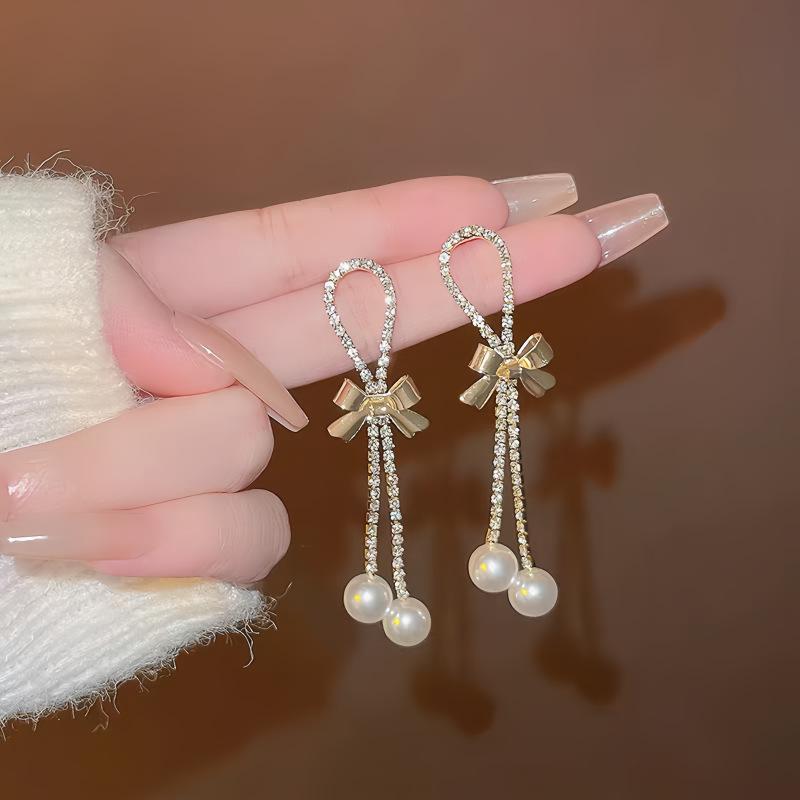 Korean High-End Rhinestone Pearl Tassel Earrings: Elegant Bow Design with Silver Needle for Women золотой
