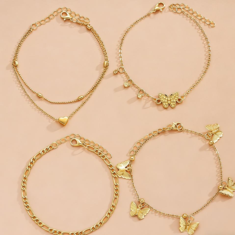 4-piece Gold Butterfly Multi-layer Anklet Set, Creative Beaded Heart Chain Anklet, Suitable for Vacation and Beach Wear.