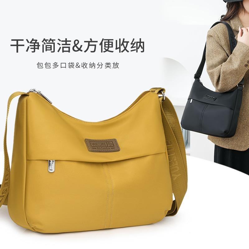 Einfacher und großzügiger Schulterrucksack Vielseitige, spritzwassergeschützte Nylontasche mit großem Fassungsvermögen Modetrend schräg getragener Damenrucksack