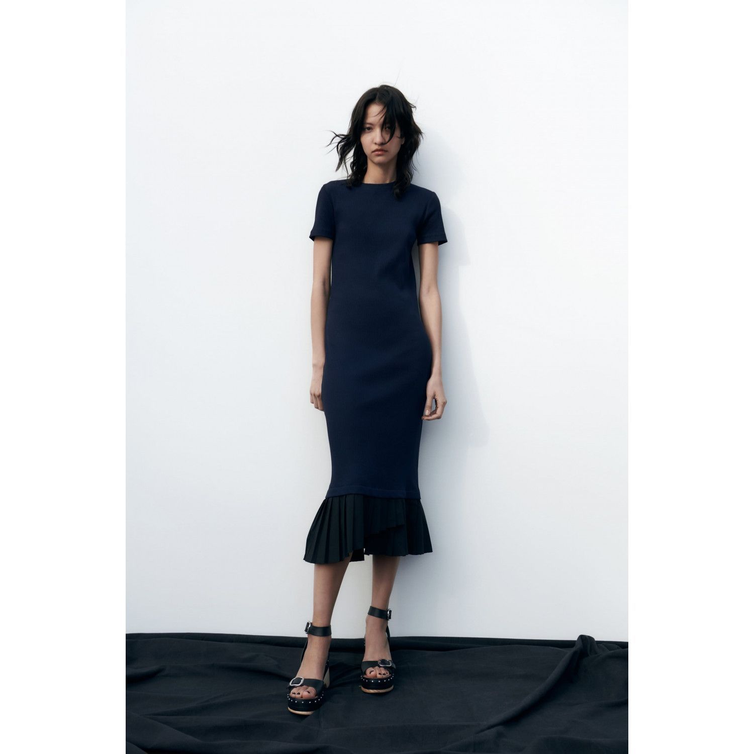 

DRESS WITH PLEATED HEM