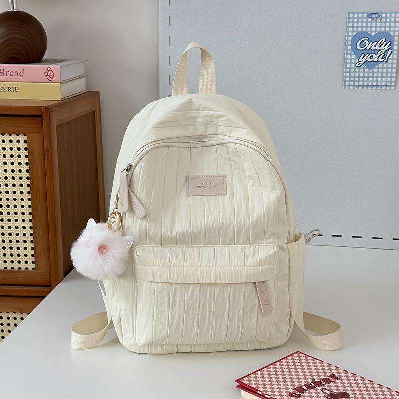 School bag junior high school girls large capacity solid color light primary school backpack high value girl versatile backpack