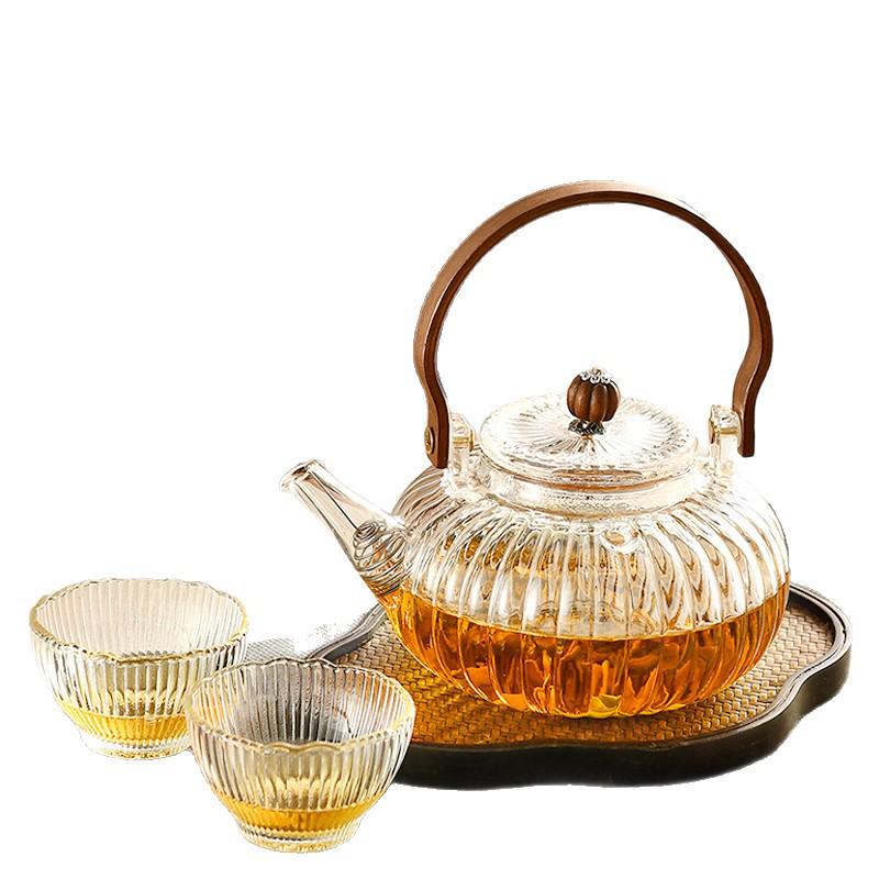 Pumpkin-Shaped High-Temperature Resistant Glass Teapot with Handle for Stove and Electric Ceramic Stove Heating.
