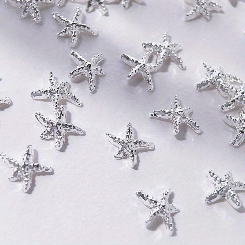 Goldene Seestern-Nagelanhänger Meeresstil Glitzernde Strasssteine Stern-Nagelkunst-Dekorationen Frühling Sommer 10 Stück 3D-Legierung DIY-Nagelsteine Geschenk für Mädchen
