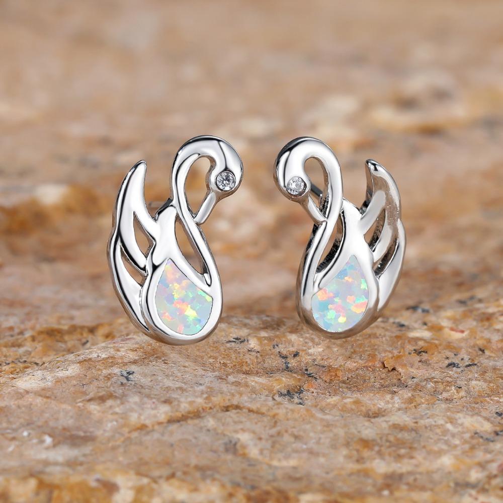 Модные серьги-лебеди с кристаллами циркона — фото 5