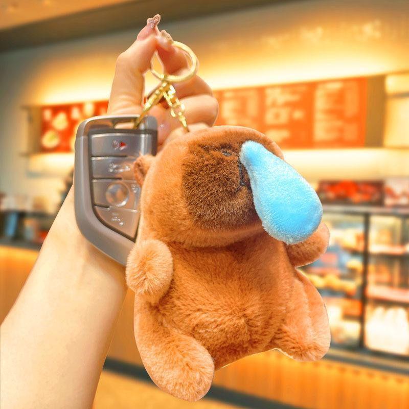 Adorable Capybara Plush Pendant with Floral Quilted Military Coat Keychain