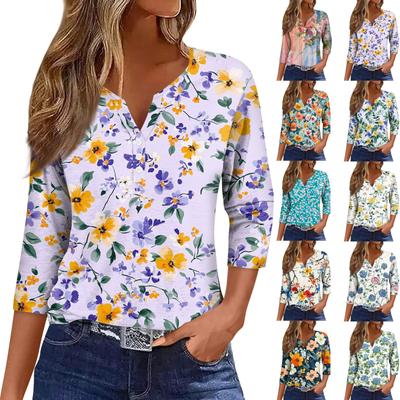 Blusa holgada informal con estampado floral y mangas de siete cuartos con cuello en V para mujer