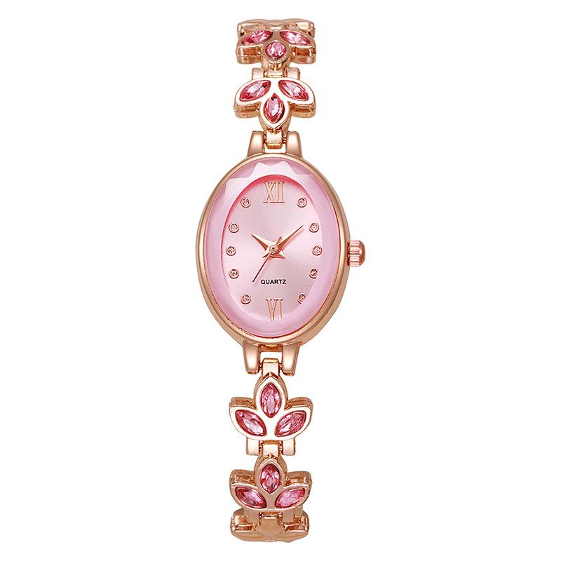 Luxury Rhinestone Women's Wristwatch with Round Dial and Colored Diamond Bracelet.