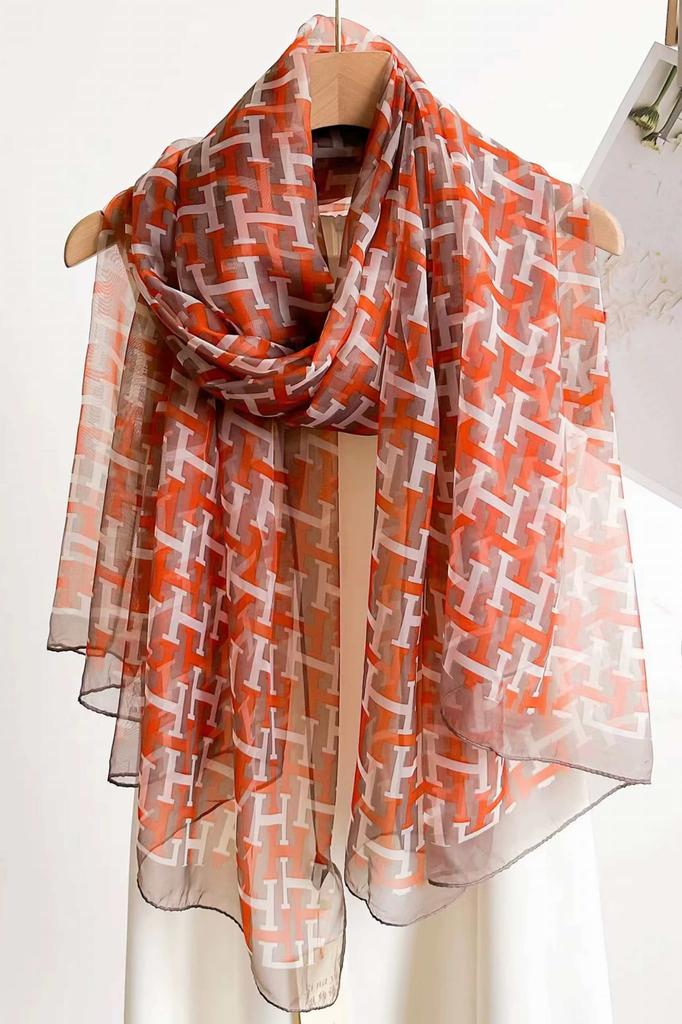 Orange Scarf with a Geometric Pattern - A Modern Styling Accent