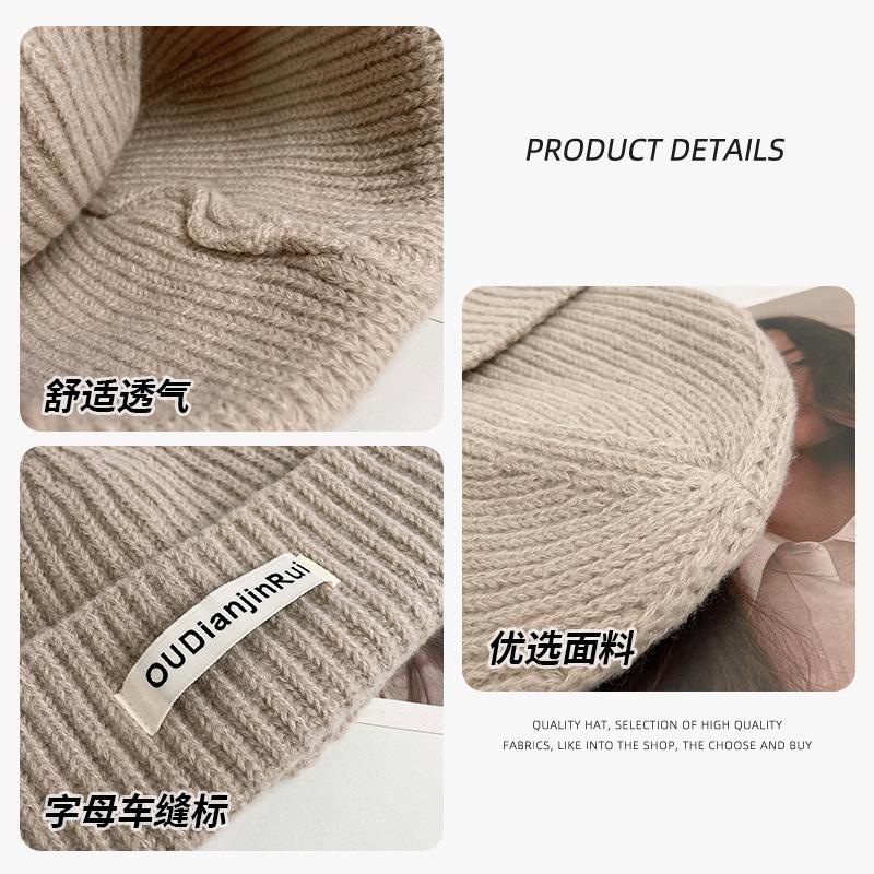 Autumn and winter versatile fabric label knitted hat thickened large head circumference showing face small wool hat cold-proof and warm ear protection