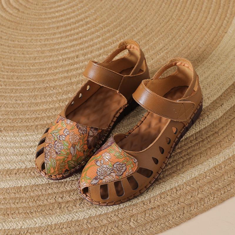 Summer new leather hollow sandals women's flower embroidery flat bottom soft sole mother shoes Velcro shallow mouth